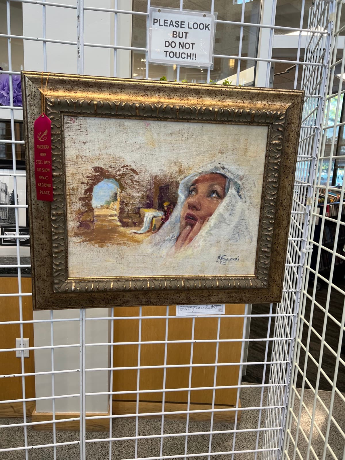 Impressionist oil portrait of a woman with a head covering in warm, gentle light